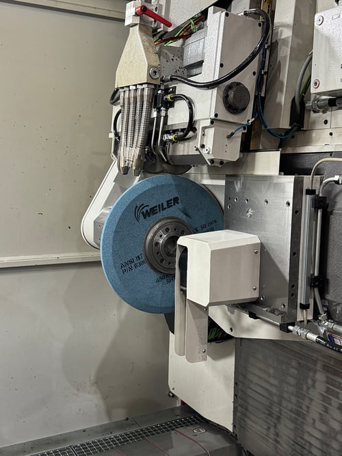 Custom Weiler gear grinding wheel installed in the Atlanta Gear Works grinding machine.