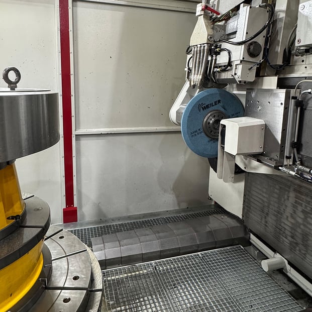 Custom-profiled Weiler wheel installed in the manufacturer’s gear grinding cell.