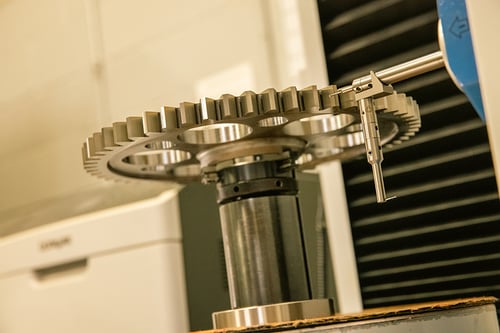 Gear being measured after the gear grinding process