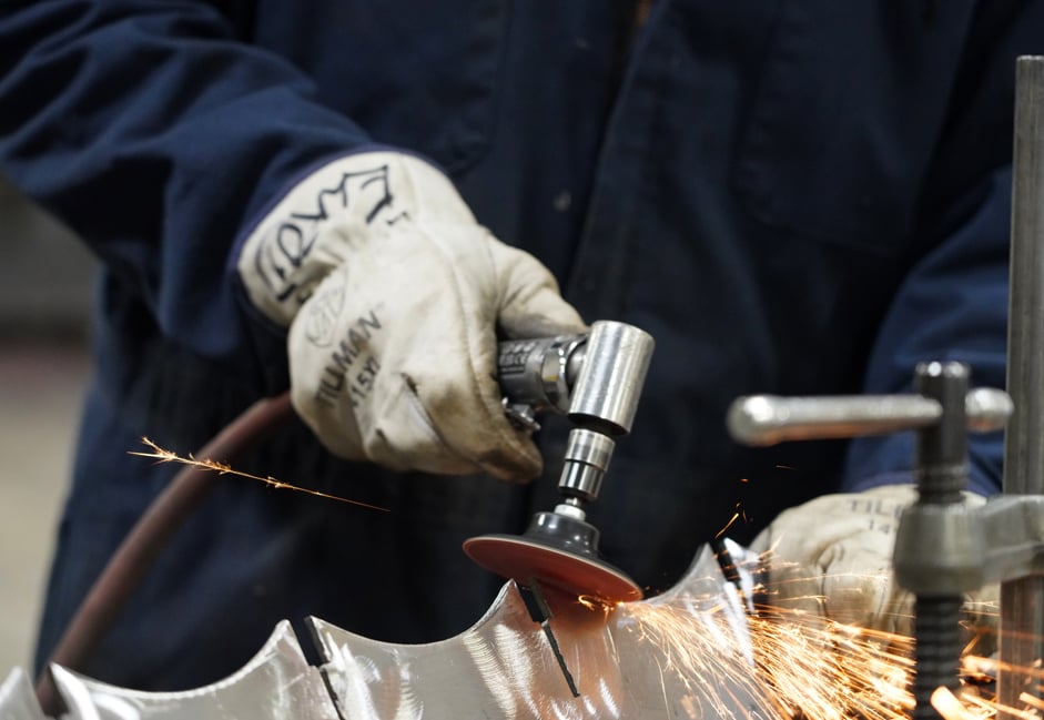Blending disc finishing a part.