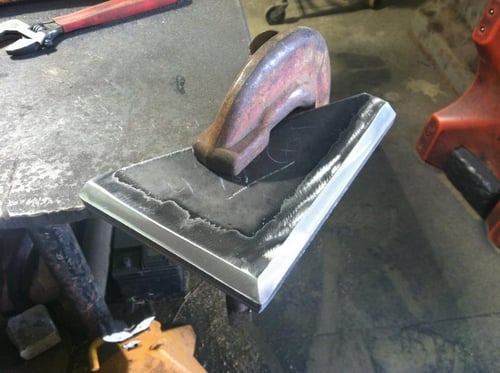 beveled plate with mill scale removed, ready for welding