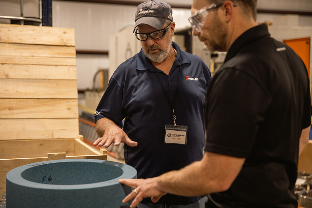 Weiler specialists reviewing a vitrified grinding wheel Weiler specialists reviewing a vitrified grinding wheel
